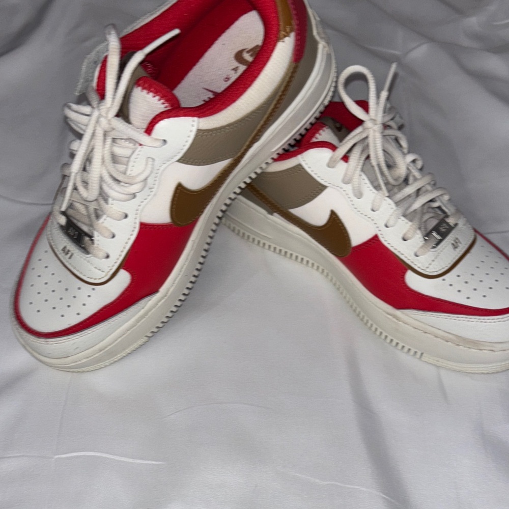 Red and White Sneakers with Brown Accents